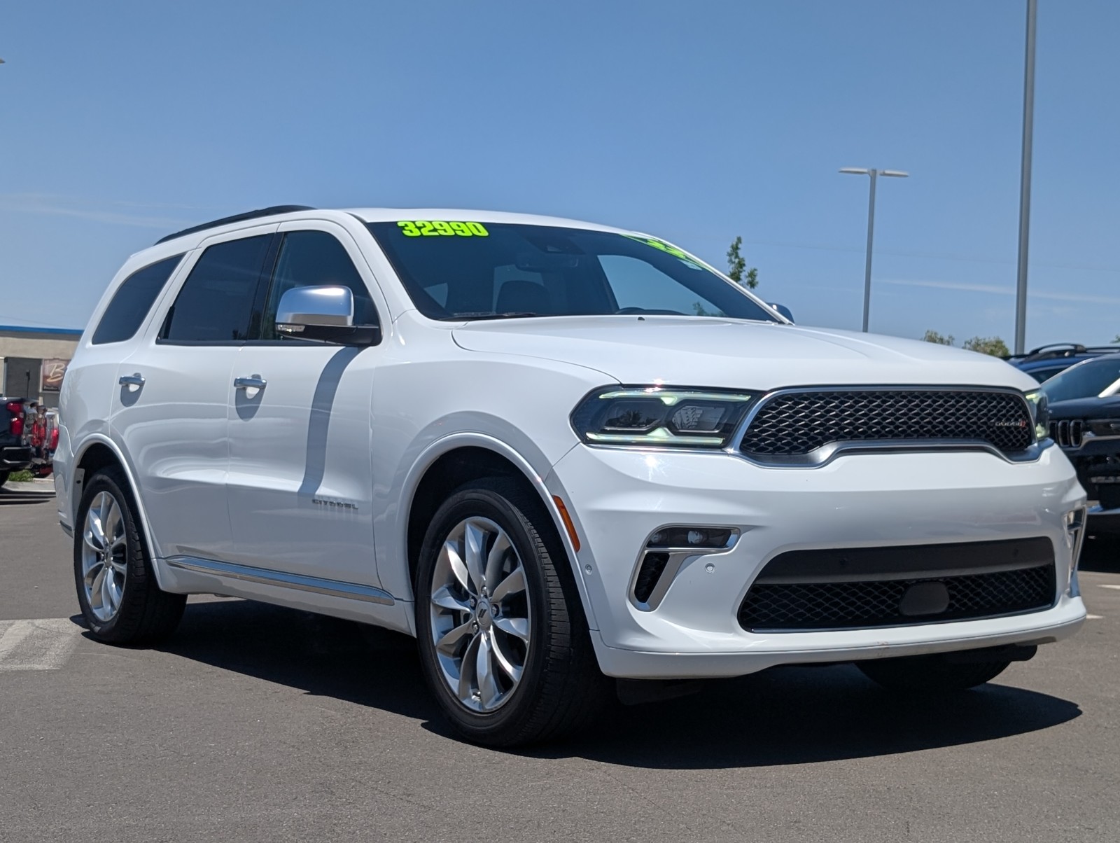 Used 2022 WHITE Dodge Citadel image 1
