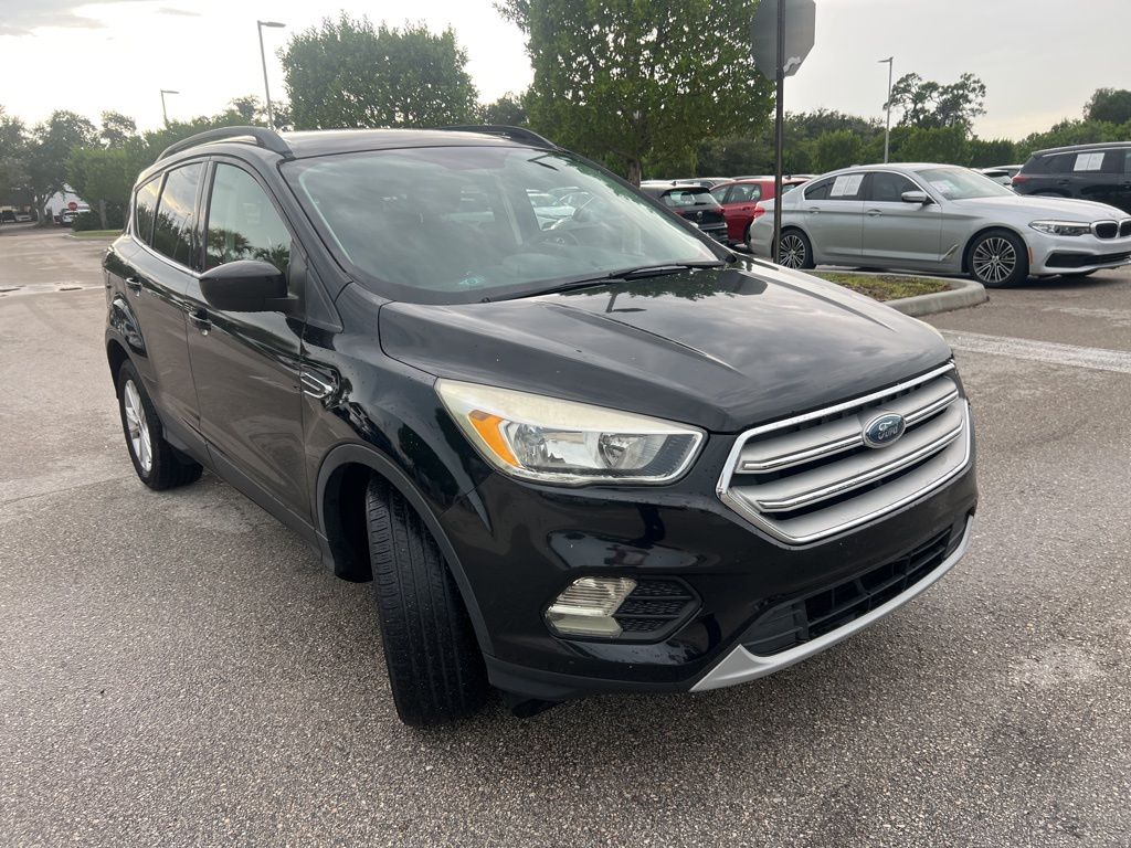 Used 2018 Ford Escape SE with VIN 1FMCU0GD4JUA07100 for sale in Fort Pierce, FL