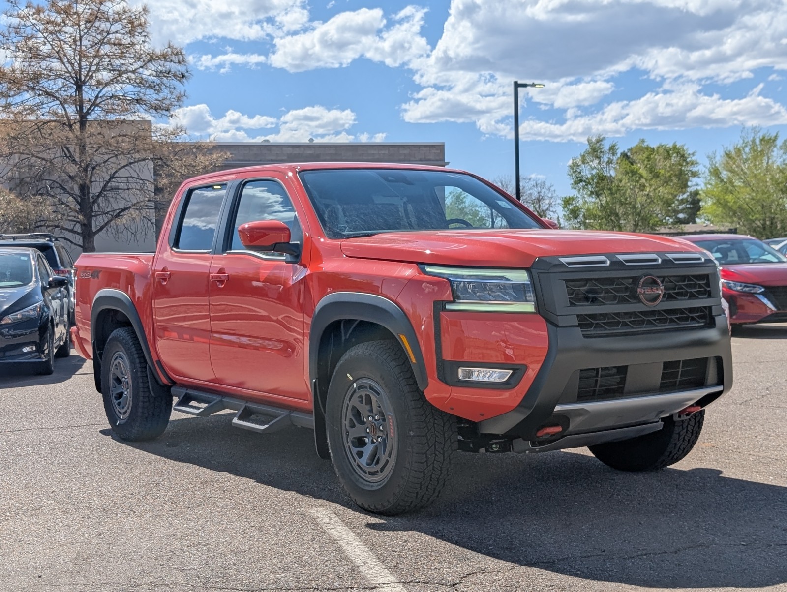New 2025 Afterburn Orange Nissan Crew Cab PRO-4X® image 1