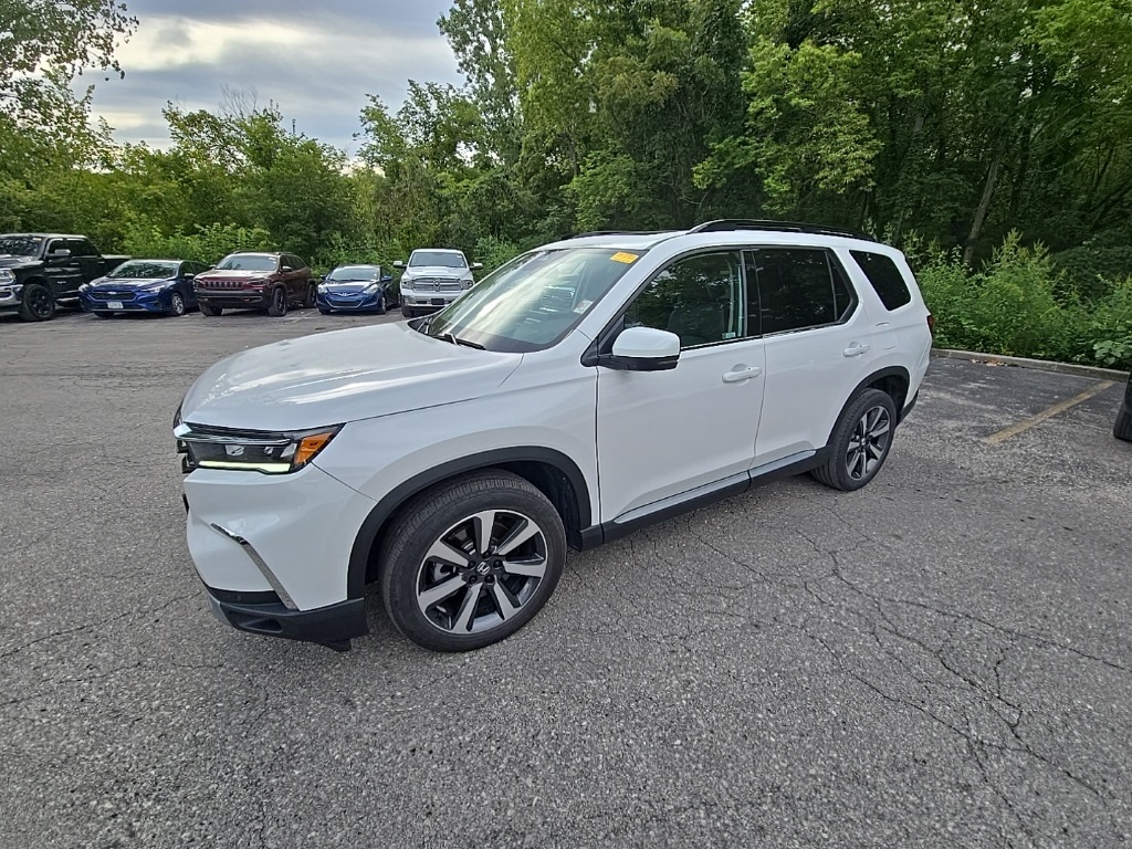 Used 2023 Honda Pilot Elite with VIN 5FNYG1H84PB016034 for sale in Kansas City