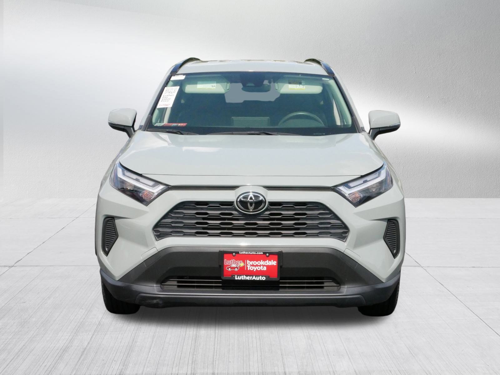 Certified 2022 Toyota RAV4 XLE with VIN JTMP1RFV7ND086619 for sale in Brooklyn Center, Minnesota