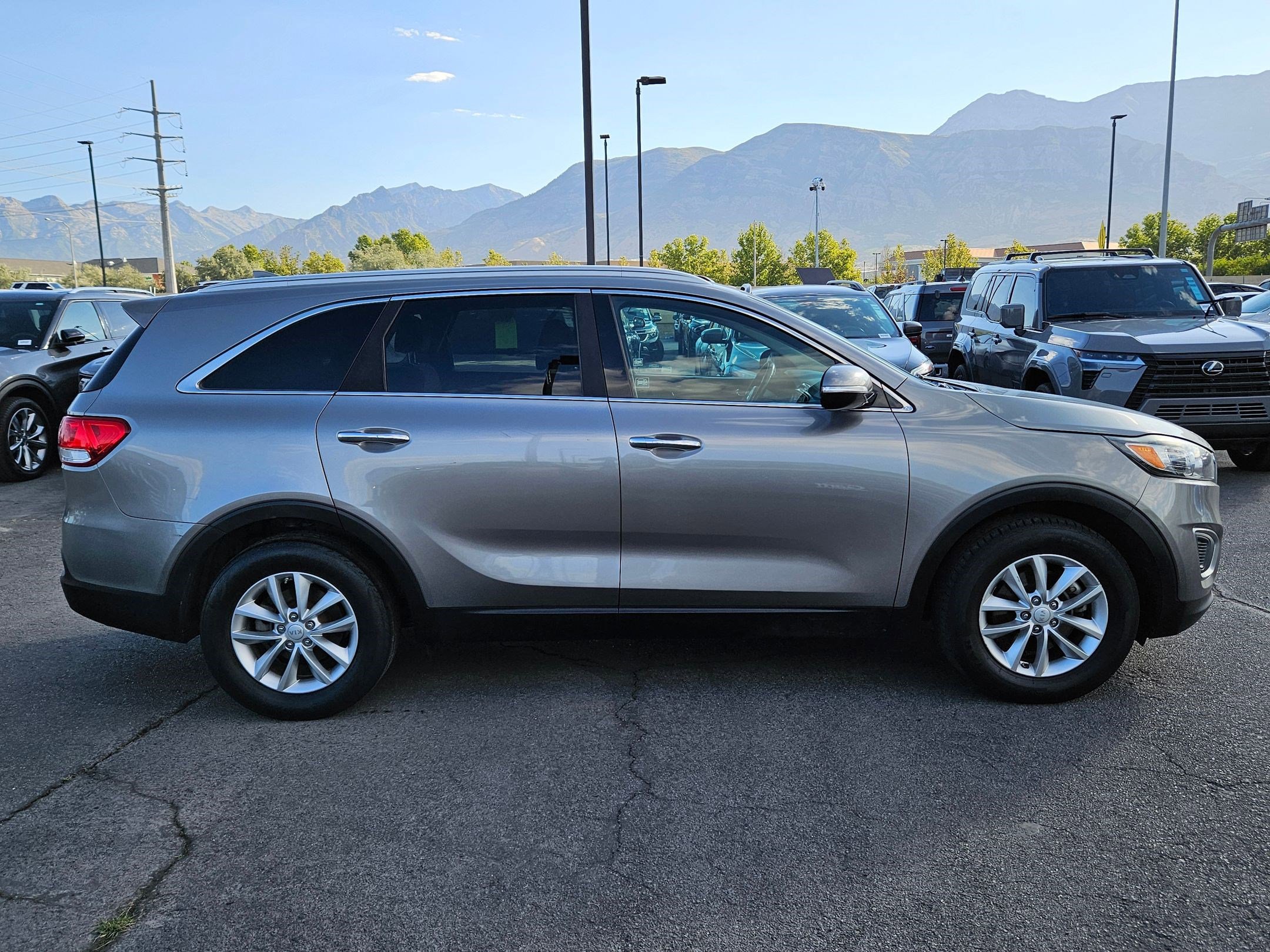 Used 2016 Kia Sorento LX with VIN 5XYPG4A32GG116962 for sale in American Fork, UT