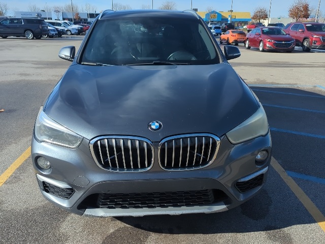 Used 2017 BMW X1 28i with VIN WBXHT3C32H5F82107 for sale in Saginaw, MI