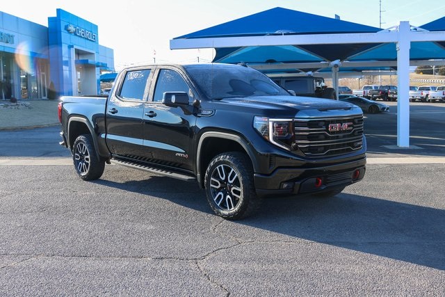 Used 2024 Black GMC AT4 image 1