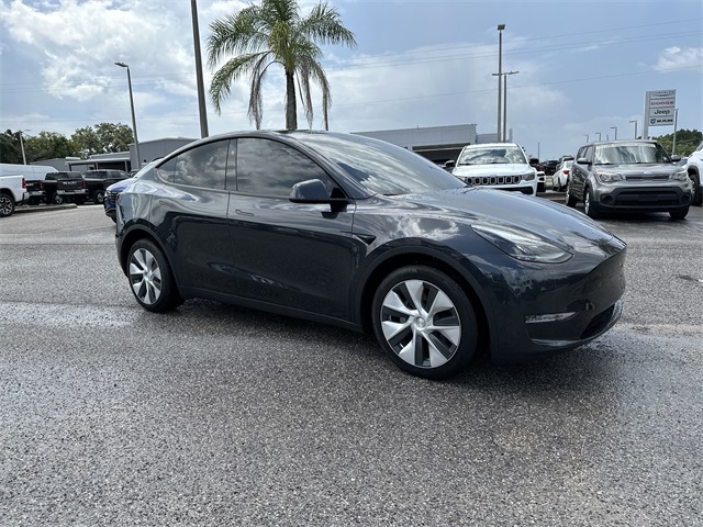 Used 2024 Tesla Model Y Long Range with VIN 7SAYGDED1RF048240 for sale in Dade City, FL