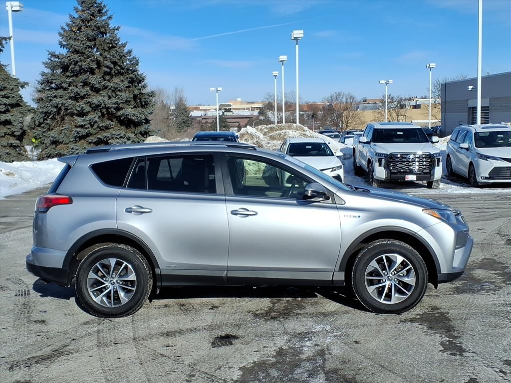 Certified 2018 Toyota RAV4 LE with VIN JTMRJREVXJD227607 for sale in Burnsville, Minnesota