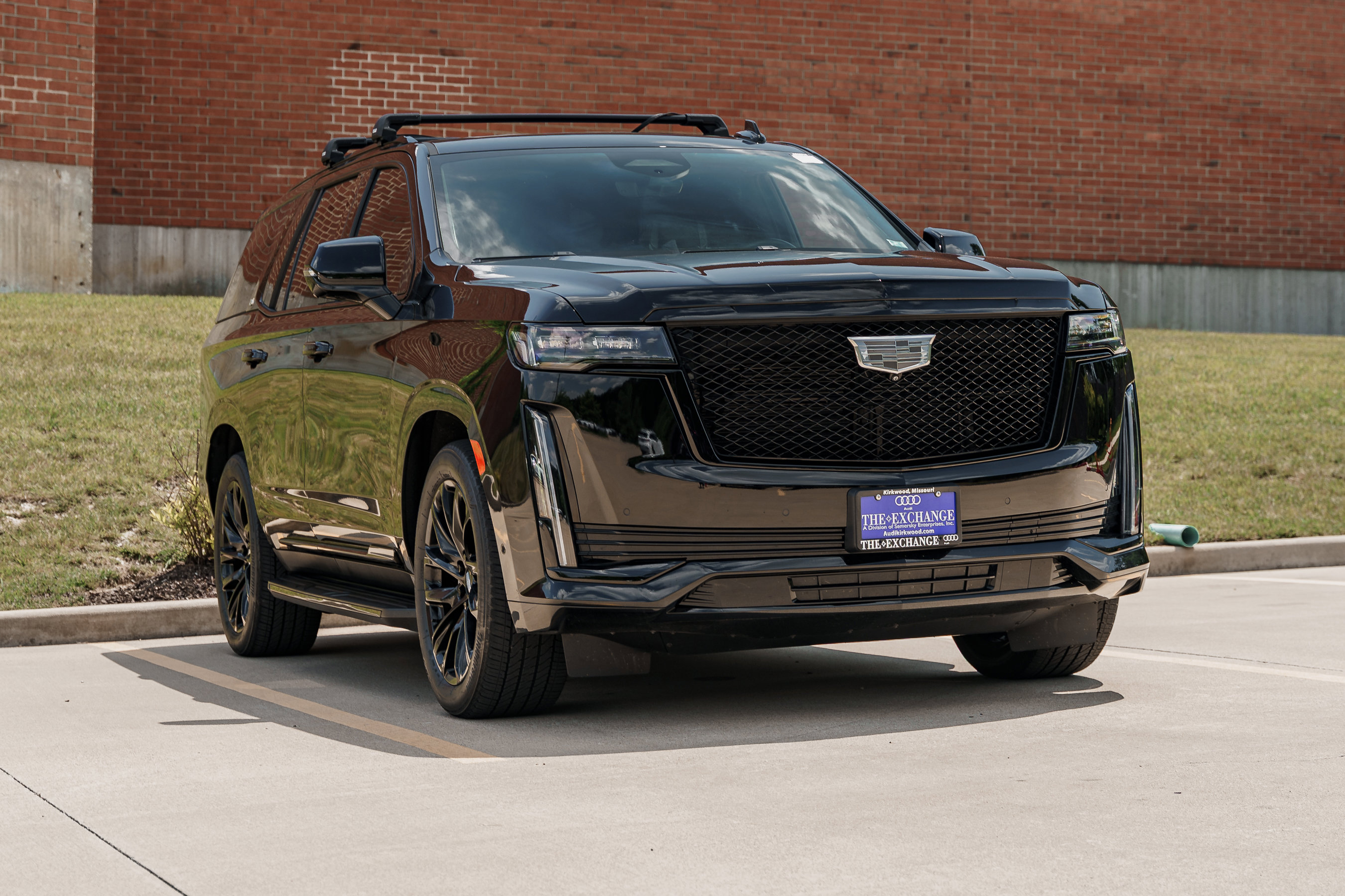 Used 2023 Black Raven Cadillac 4WD Sport Platinum image 1