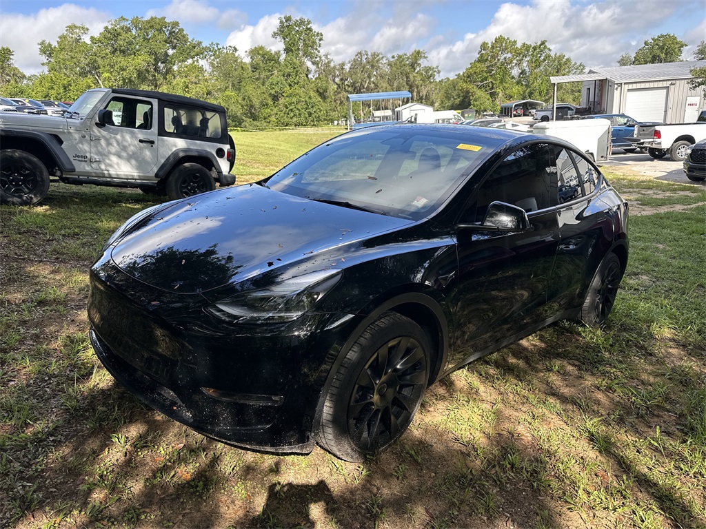 Used 2023 Tesla Model Y Long Range with VIN 7SAYGDEEXPF697010 for sale in Inverness, FL