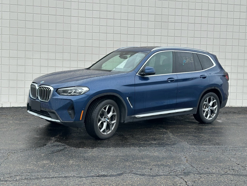 Used 2024 Blue Metallic BMW xDrive30i image 1