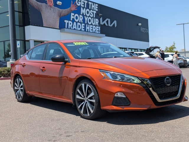 Used 2021 ORANGE Nissan 2.5 SR image 1