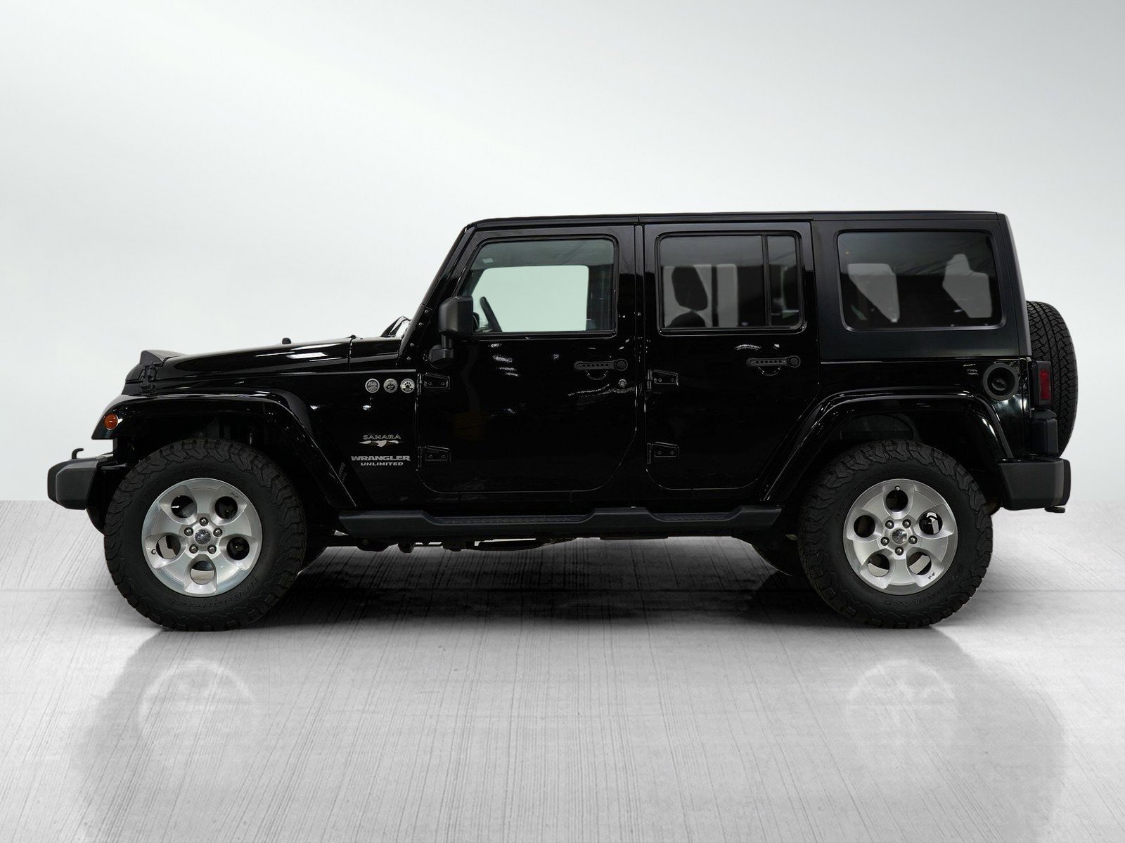 Used 2016 Jeep Wrangler Unlimited Sahara with VIN 1C4BJWEG6GL302271 for sale in Bloomington, Minnesota
