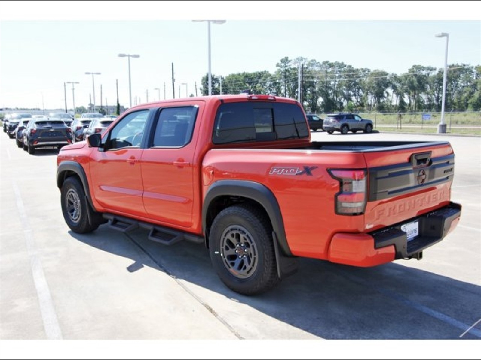 2026 Nissan Frontier Crew Cab PRO-X® Orange at Robbins Nissan