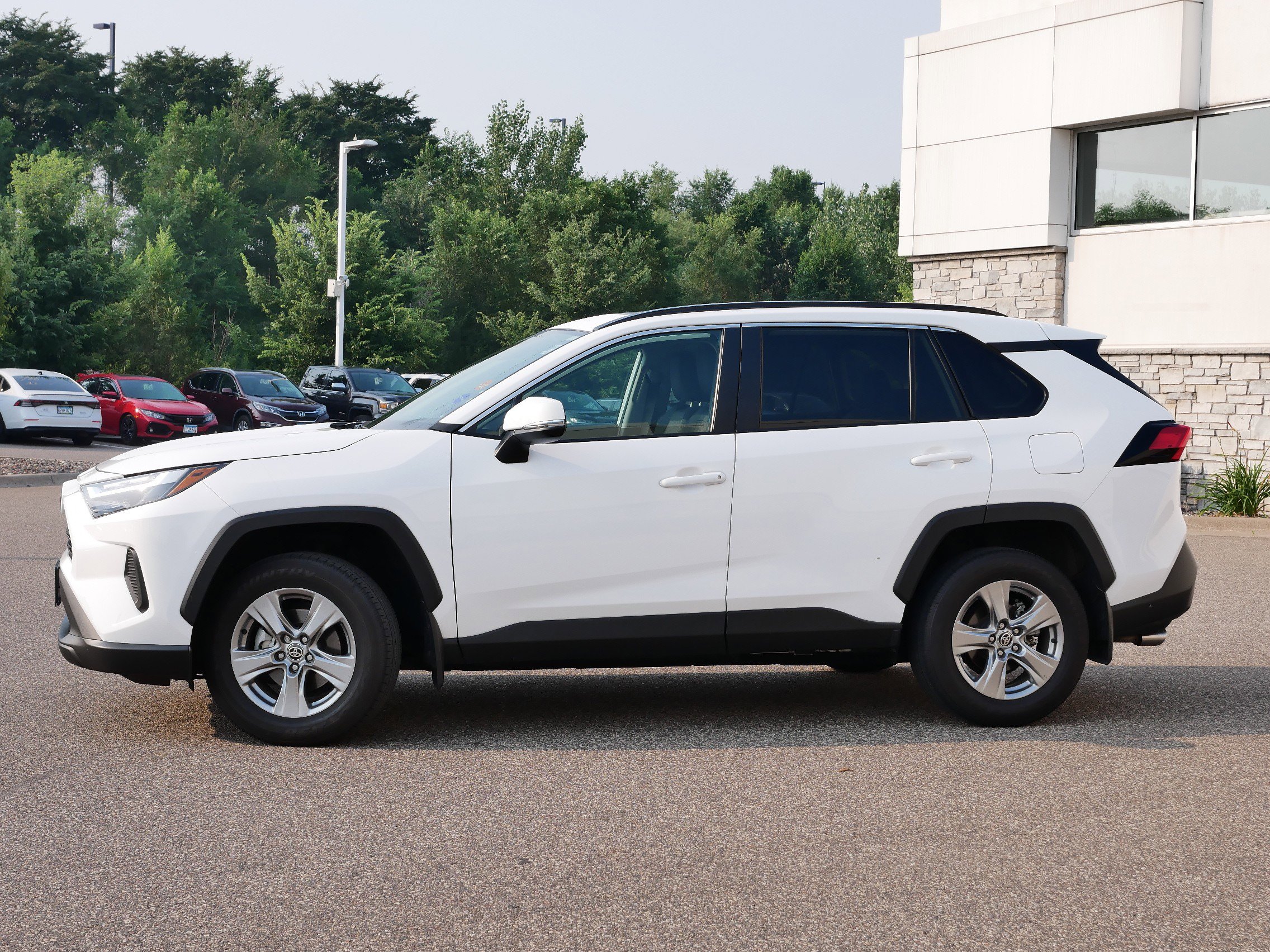 Used 2023 Toyota RAV4 XLE with VIN 2T3P1RFV6PC366071 for sale in Coon Rapids, Minnesota
