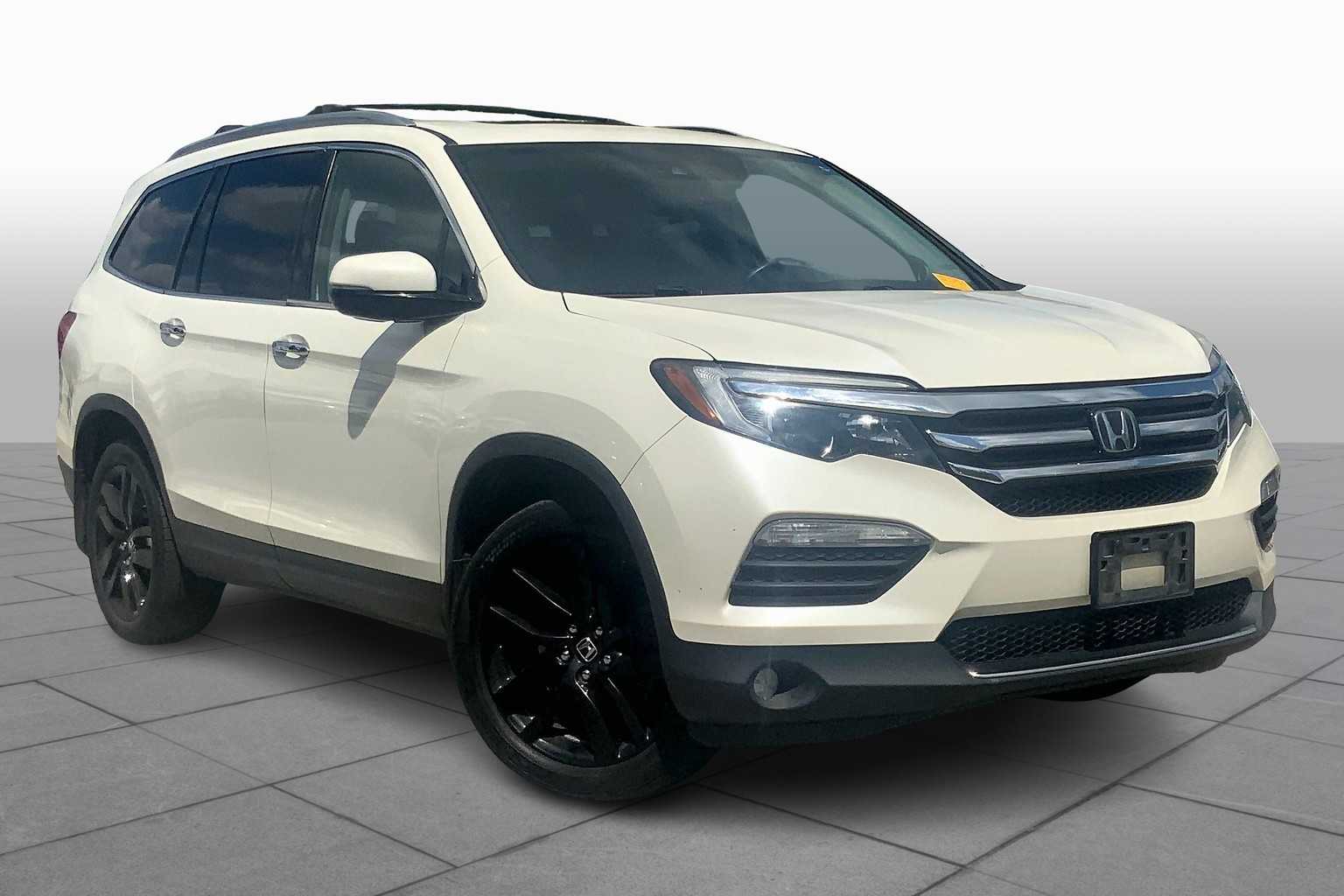 Used 2017 Honda Pilot Elite with VIN 5FNYF6H04HB048056 for sale in Kansas City