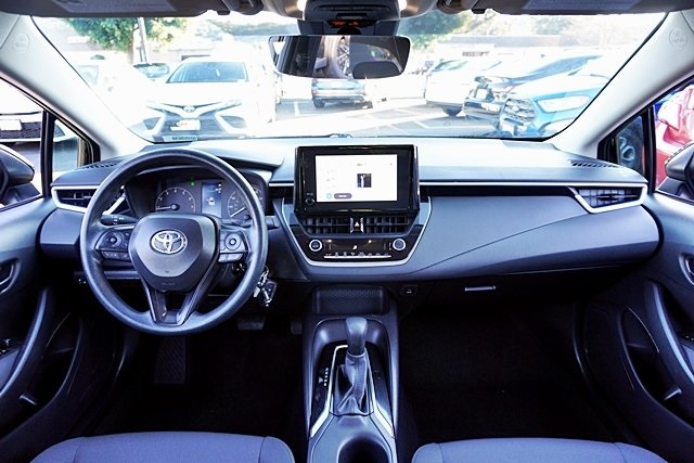 Used 2024 Black Toyota LE image 16