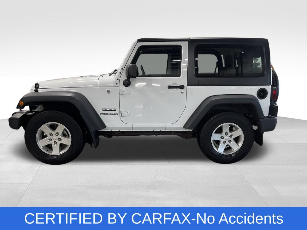 Used 2015 Jeep Wrangler Sport with VIN 1C4AJWAG5FL588534 for sale in Northfield, Minnesota