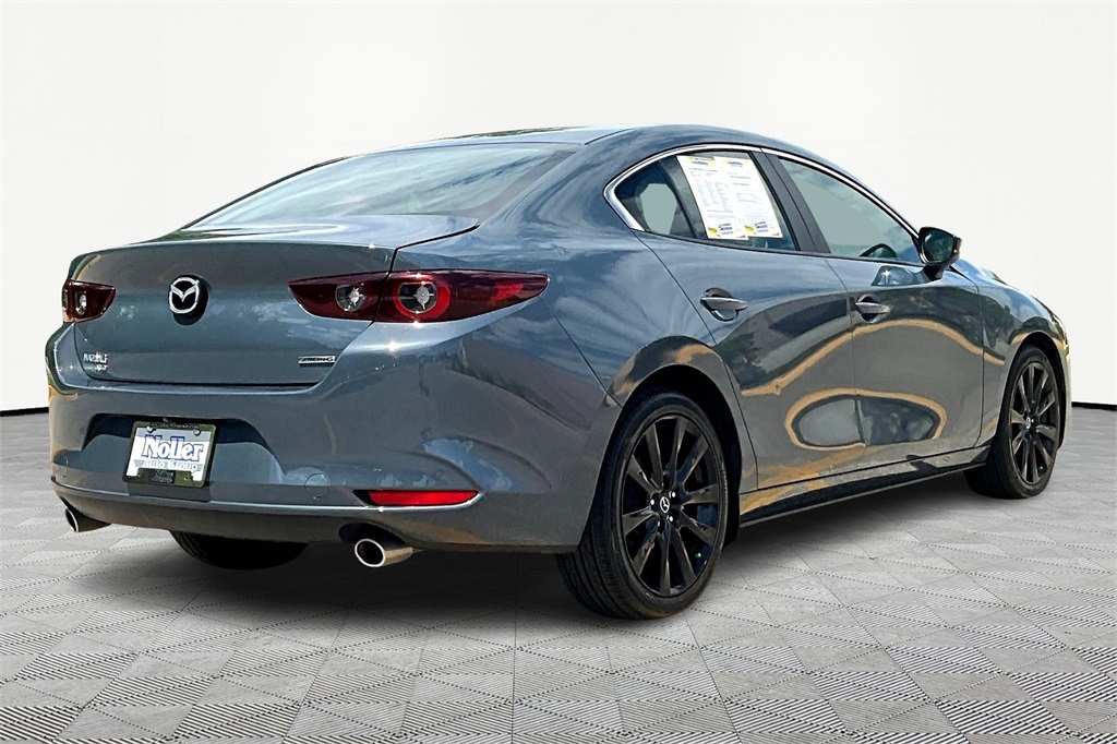Used 2023 Mazda Mazda3 Carbon Edition with VIN 3MZBPBCM6PM359274 for sale in Kansas City
