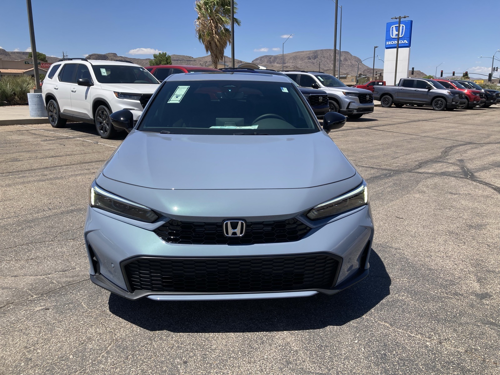 2026 Honda Civic Hatchback Sport Touring Hybrid photo 2