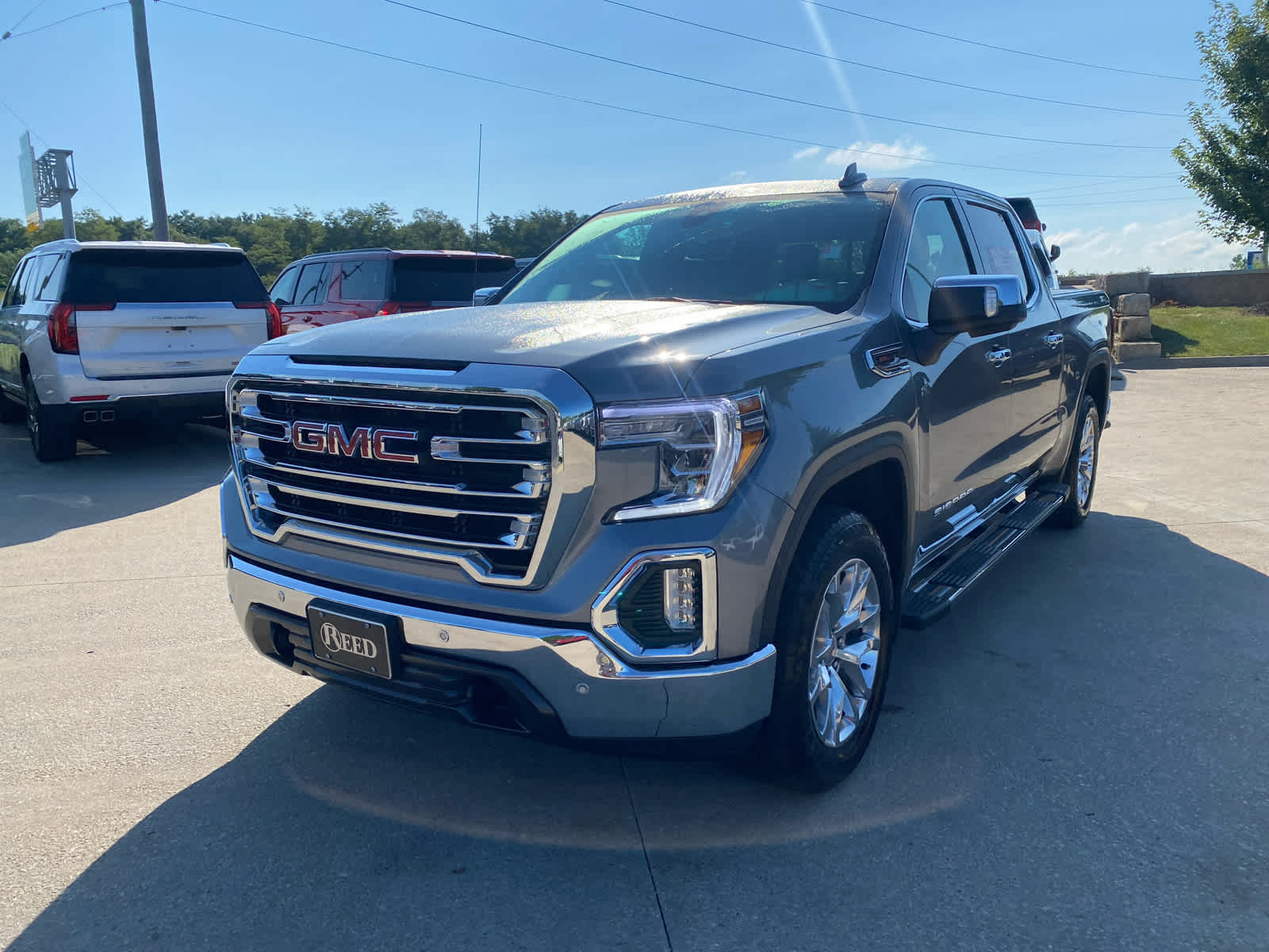 Used 2021 GMC Sierra 1500 SLT with VIN 3GTU9DELXMG140916 for sale in Kansas City