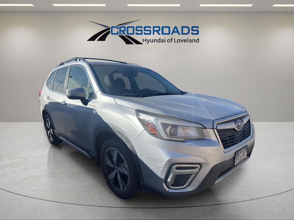 Used 2019 Subaru Forester Touring with VIN JF2SKAWC0KH517993 for sale in Loveland, CO