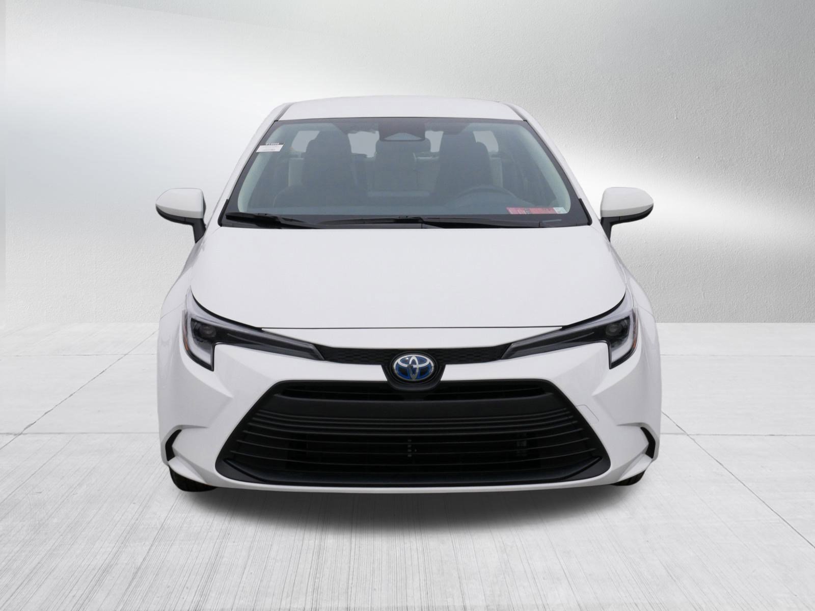 Used 2025 Toyota Corolla LE with VIN JTDBCMFE9S3090129 for sale in Brooklyn Center, Minnesota