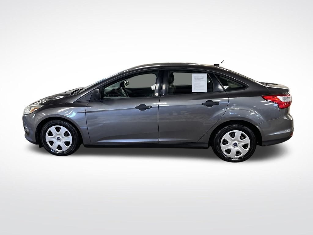 Used 2013 Ford Focus S with VIN 1FADP3E24DL327987 for sale in Traverse City, MI