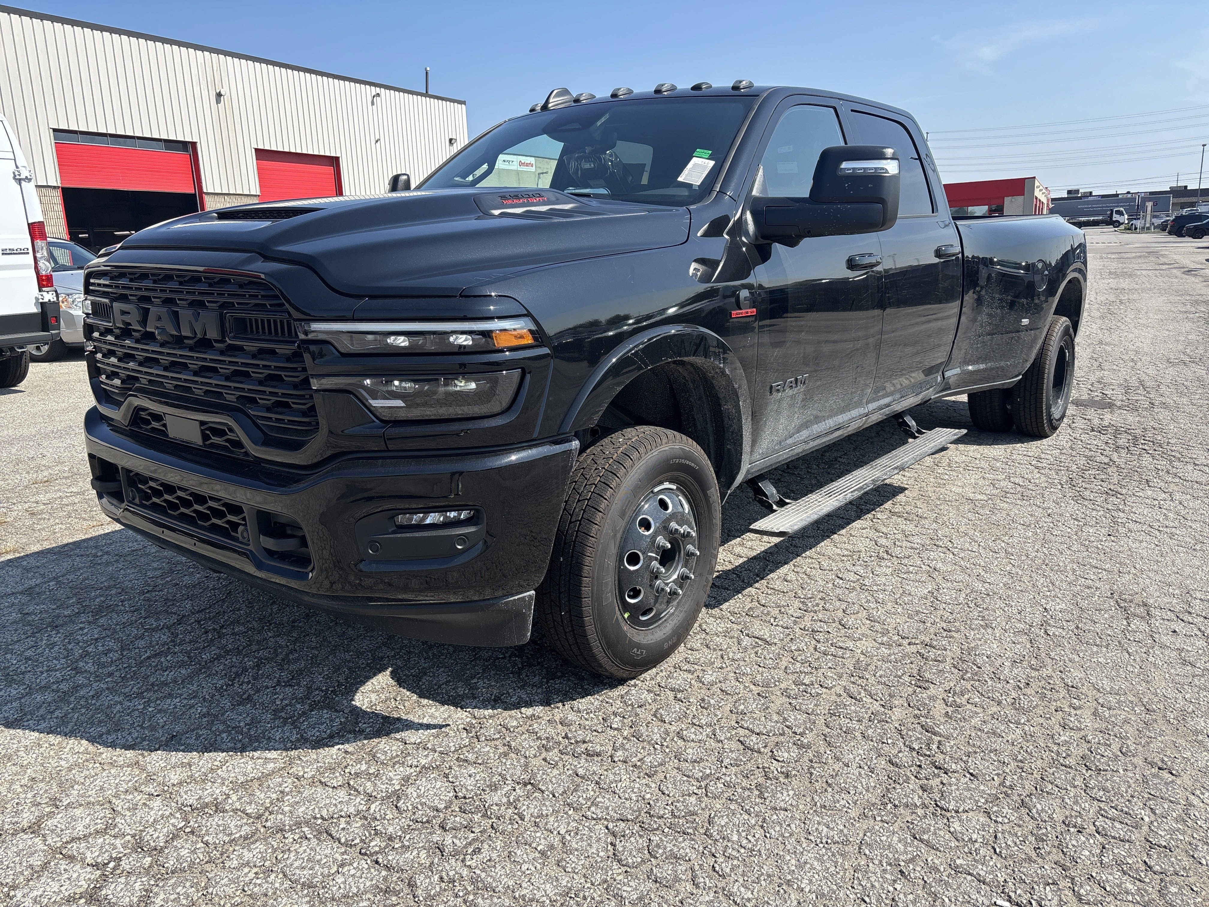 New 2025 Diamond Black Crystal Pearlcoat Ram Limited image 1