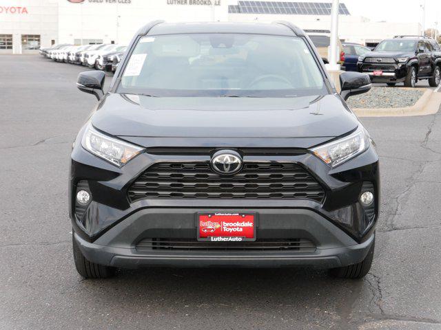 Certified 2021 Toyota RAV4 XLE with VIN 2T3P1RFV0MW179810 for sale in Brooklyn Center, Minnesota