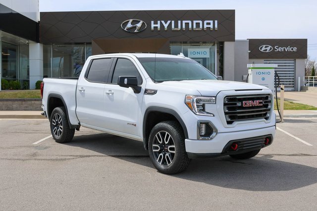 Used 2021 Summit White GMC AT4 image 1