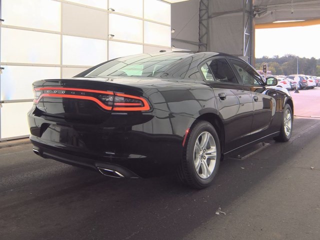 Used 2022 Dodge Charger SXT with VIN 2C3CDXBG4NH261367 for sale in West Park, FL
