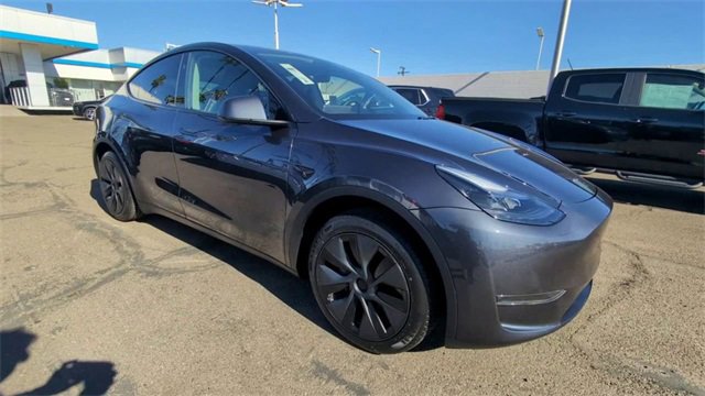 Used 2025 Tesla Model Y Long Range with VIN 7SAYGDED9SA372653 for sale in National City, CA