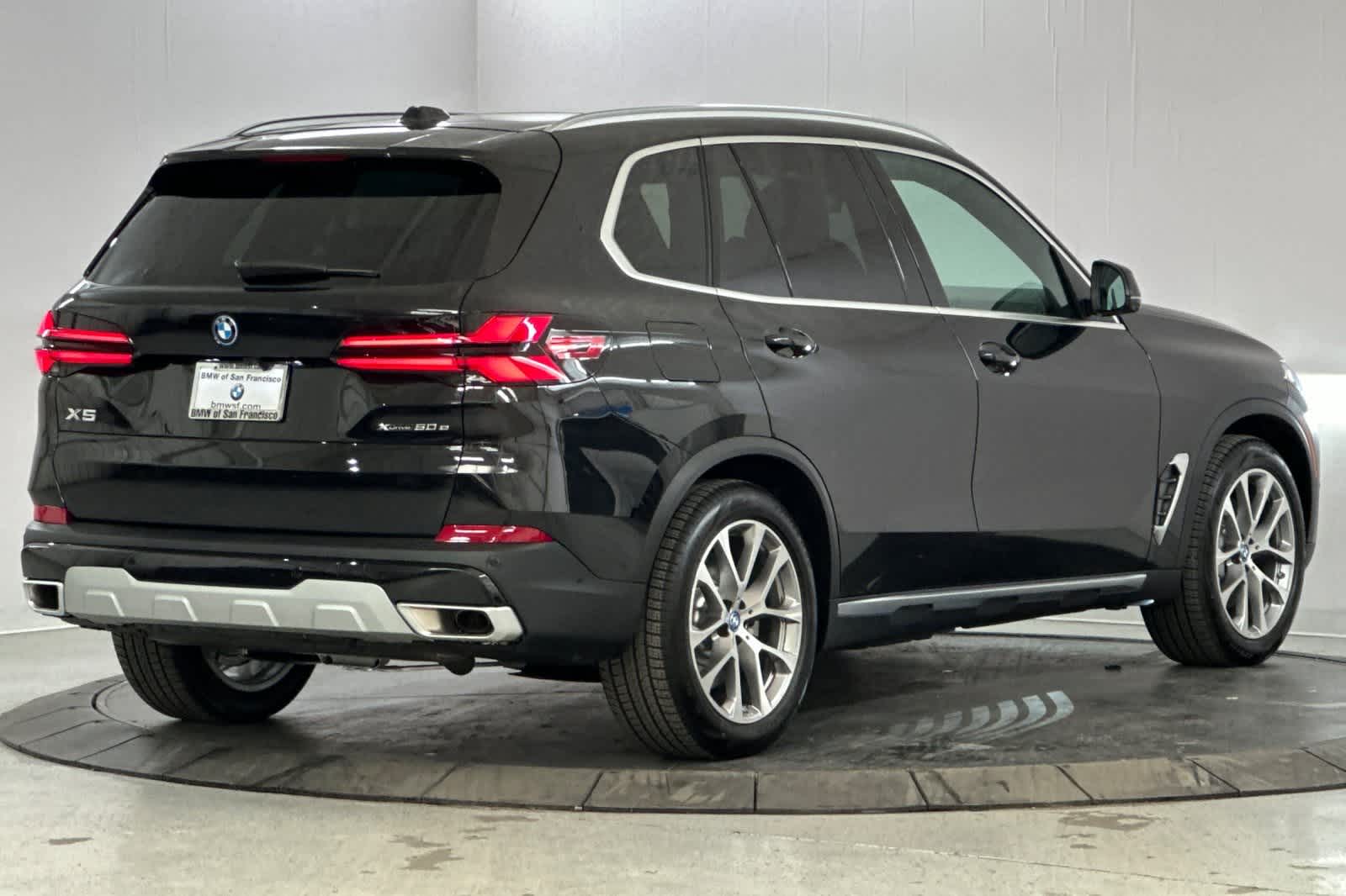 New 2025 Black Sapphire Metallic BMW xDrive50e image 2