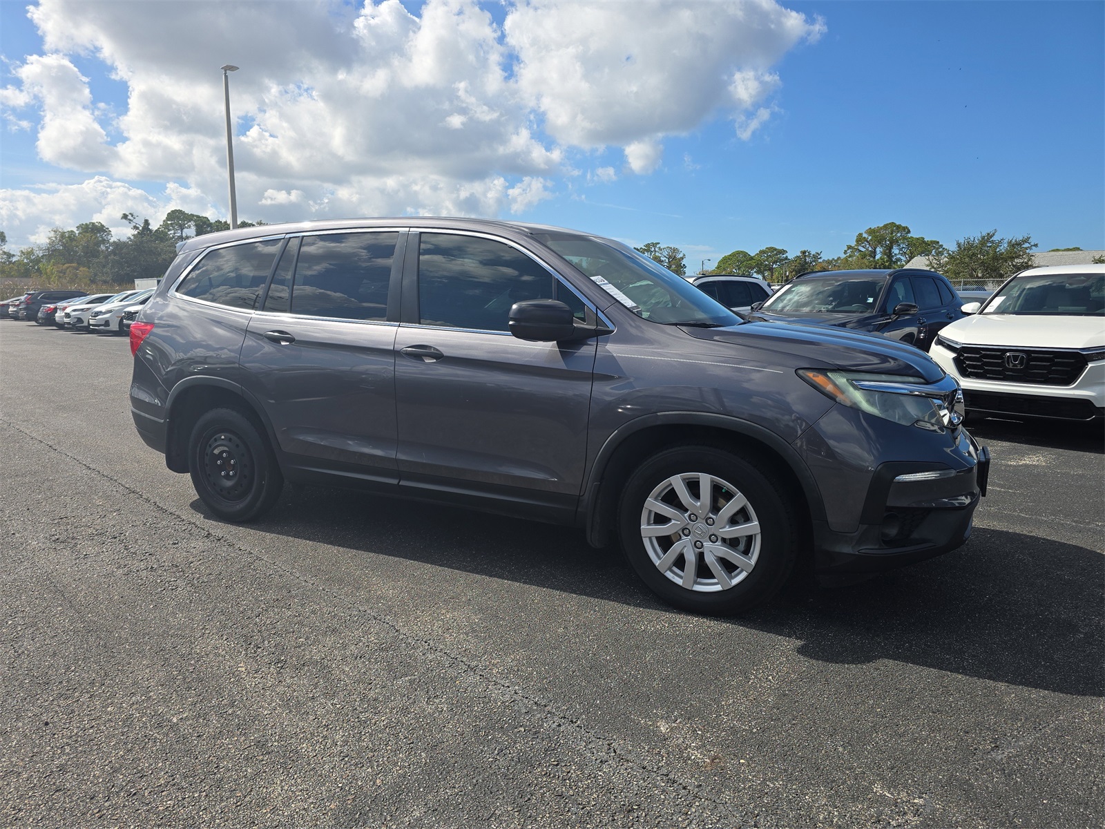 Used 2020 Honda Pilot LX with VIN 5FNYF5H18LB017565 for sale in Port Richey, FL
