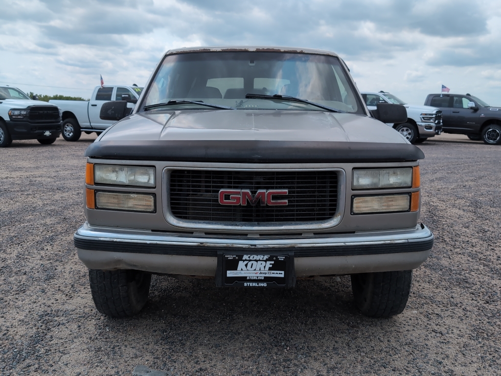 Used 1999 GMC Suburban SL with VIN 3GKFK16R0XG508432 for sale in Sterling, CO