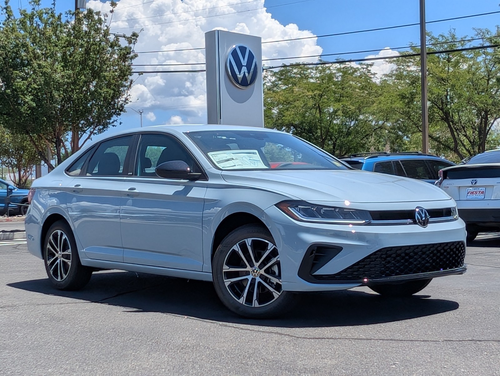 New 2025 Monument Gray Volkswagen Sport image 1