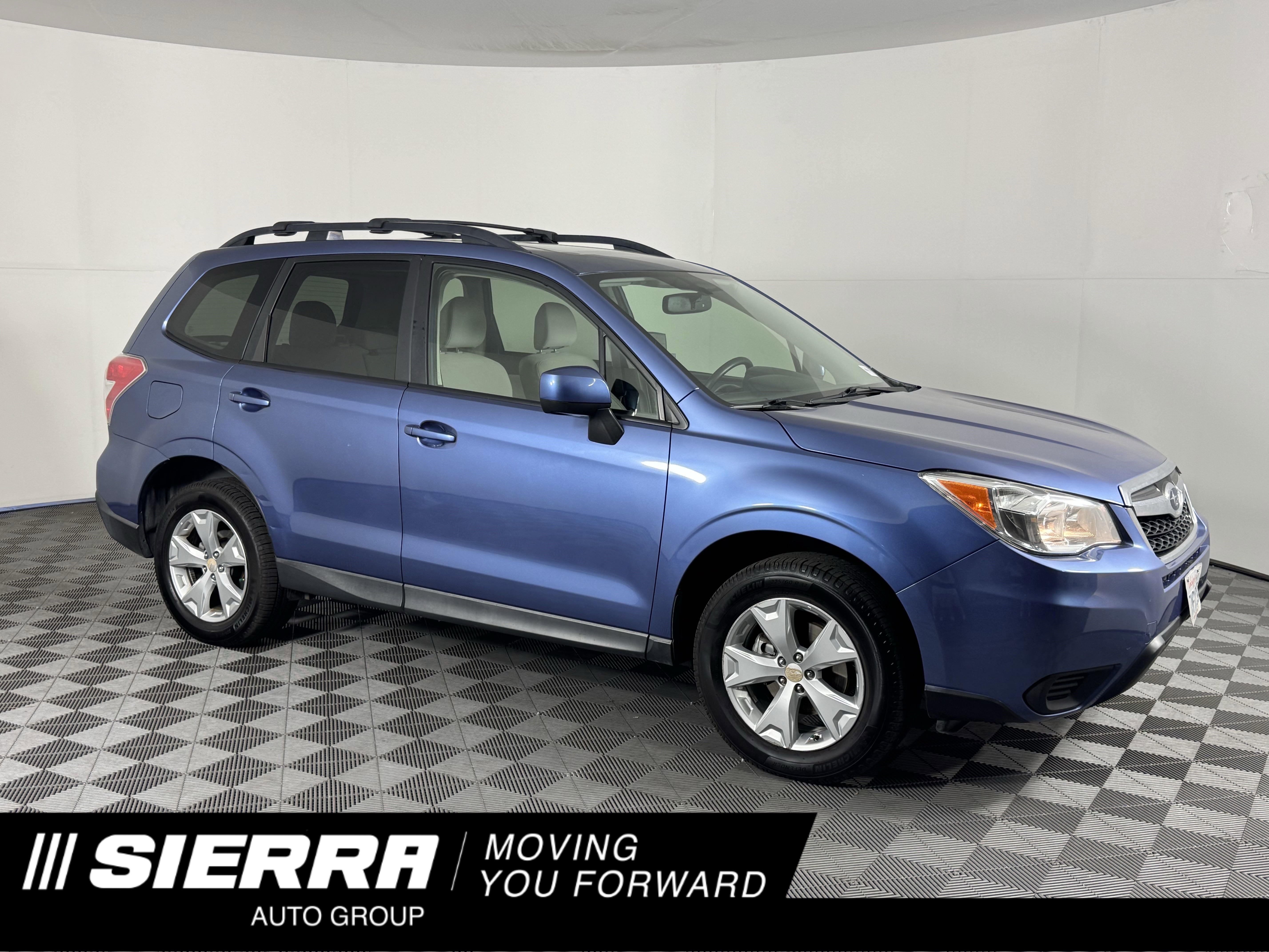 Used 2016 Quartz Blue Pearl Subaru 2.5i Premium image 1