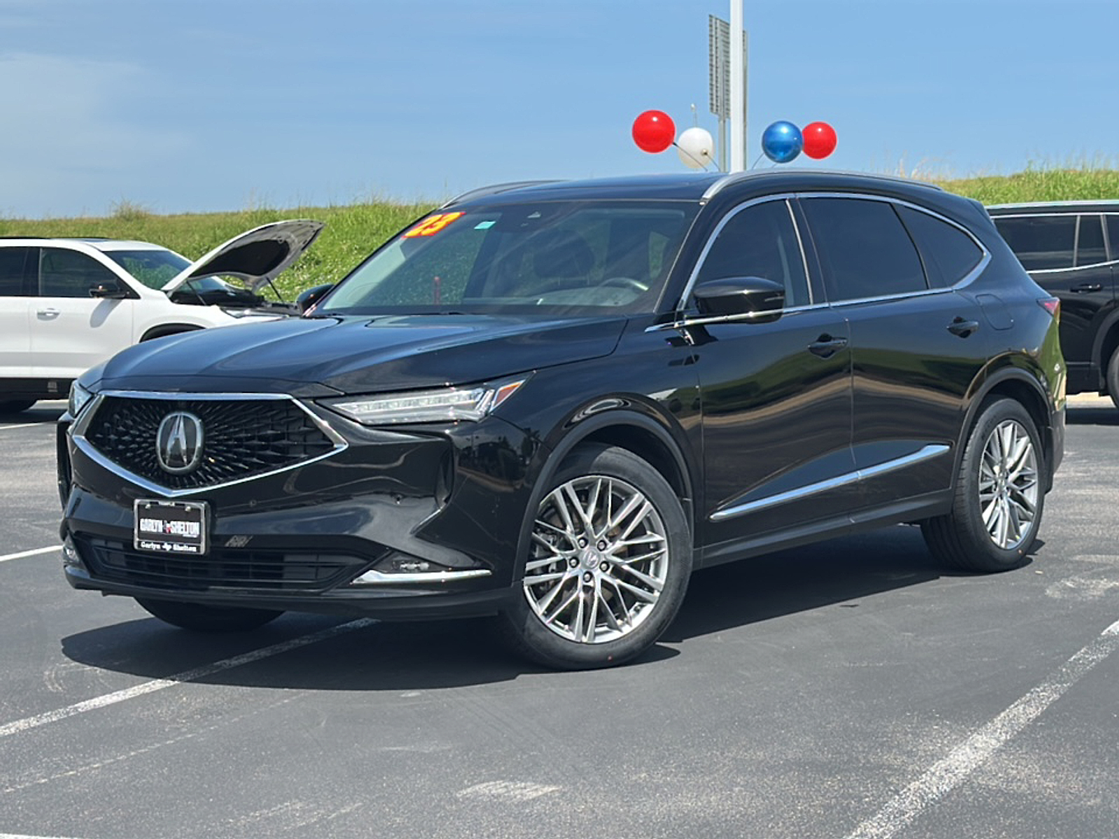 2023 Acura MDX SH-AWD Advance photo 2