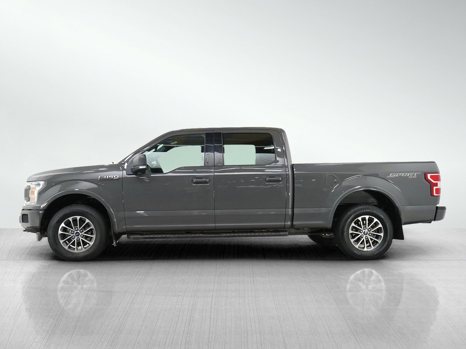 Used 2018 Ford F-150 XLT with VIN 1FTFW1E5XJFB75373 for sale in Minneapolis, Minnesota