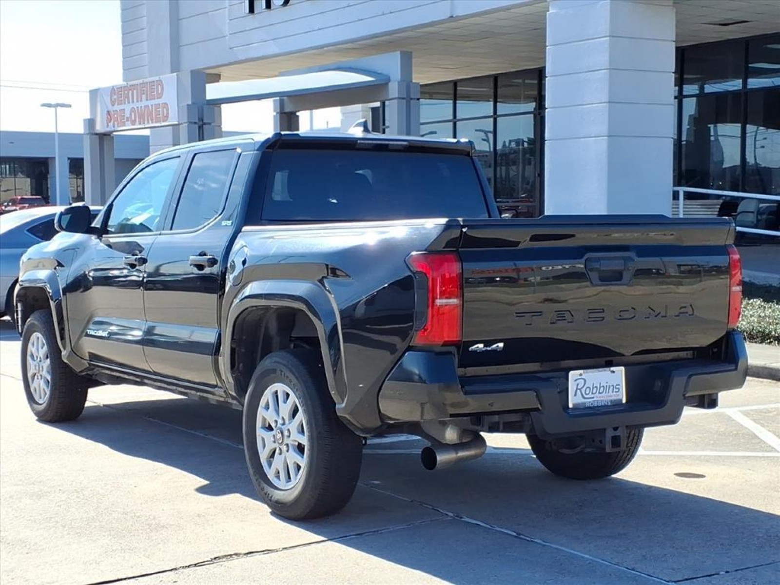 2024 Toyota Tacoma 4WD TRD Off Road Black at Robbins Nissan