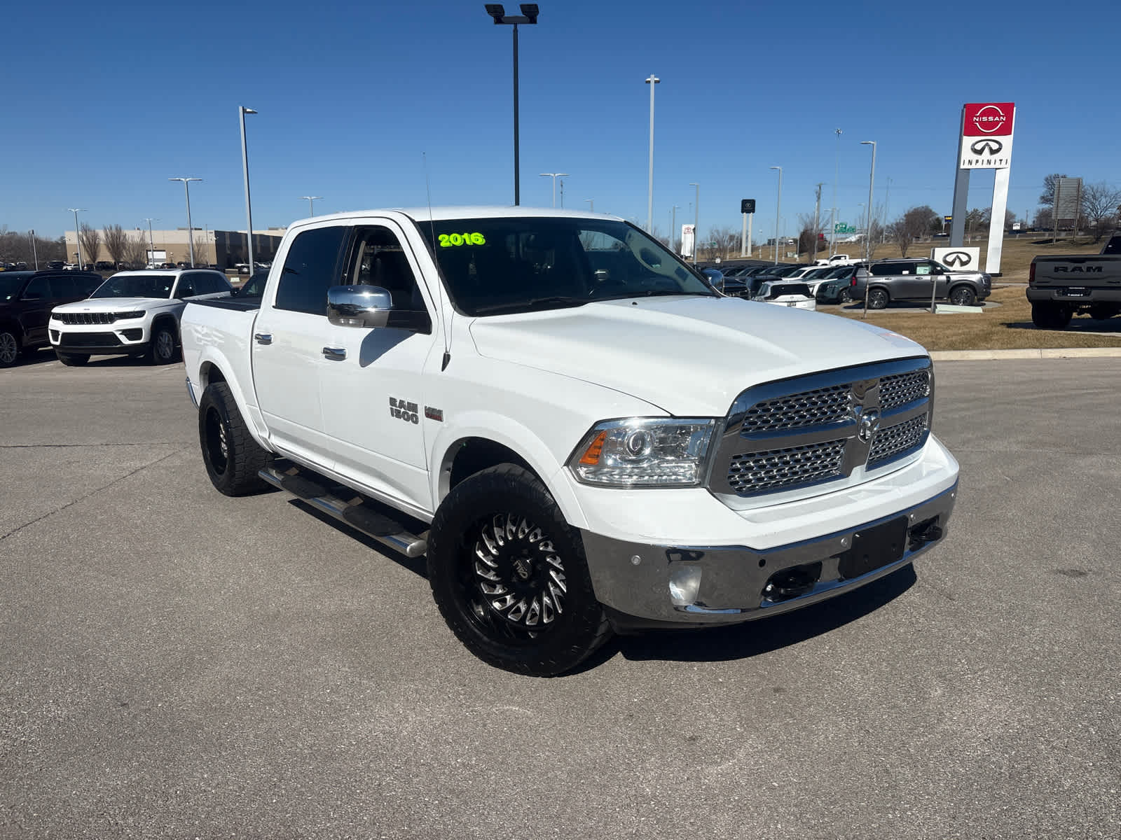 Used 2016 RAM Ram 1500 Pickup Laramie with VIN 1C6RR7NT9GS157864 for sale in Kansas City