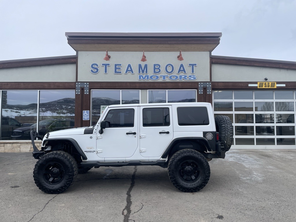 Used 2015 Jeep Wrangler Unlimited Sahara with VIN 1C4BJWEG5FL530017 for sale in Steamboat Springs, CO