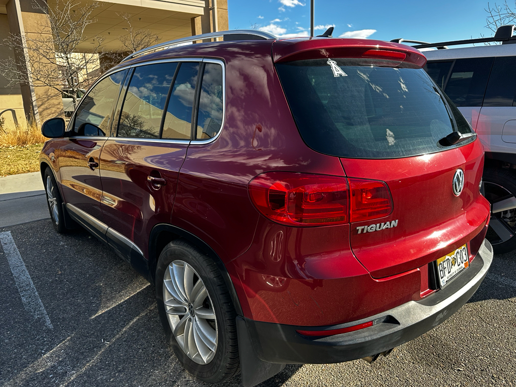 Used 2014 Volkswagen Tiguan SE with VIN WVGBV3AX5EW035947 for sale in Loveland, CO