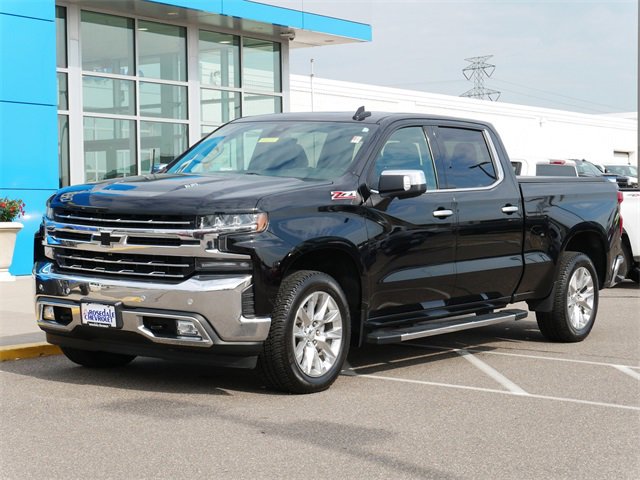 Used 2021 Chevrolet Silverado 1500 LTZ with VIN 1GCUYGEL4MZ213461 for sale in Roseville, Minnesota