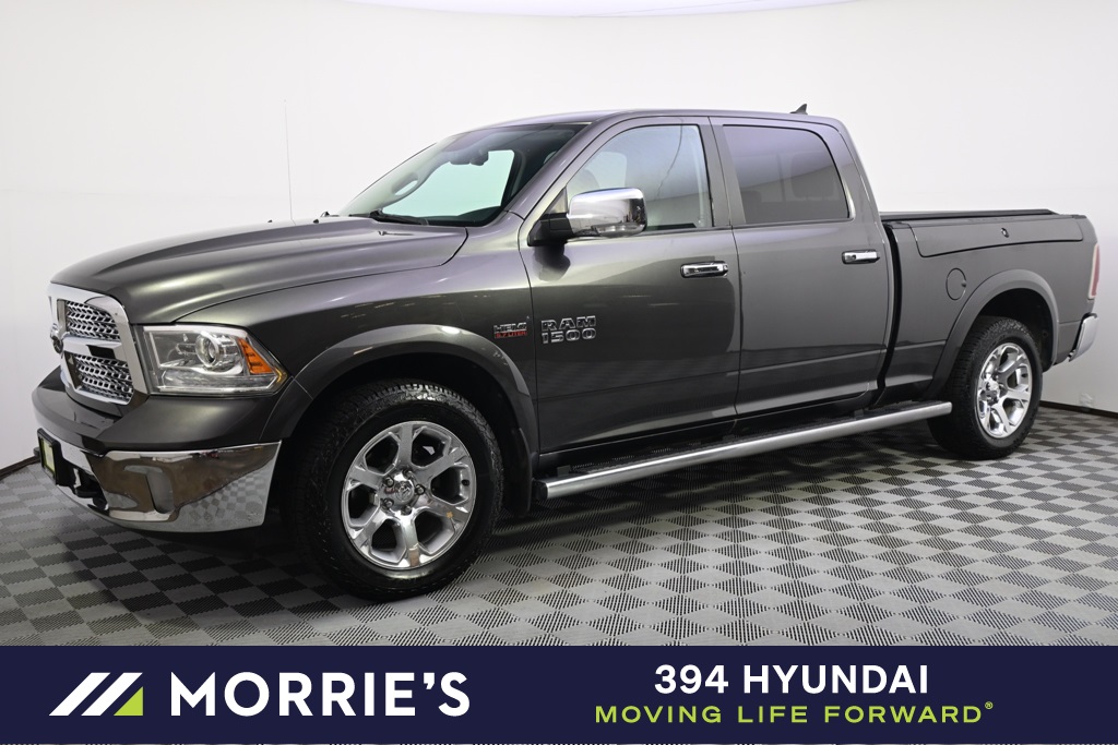 Used 2014 RAM Ram 1500 Pickup Laramie with VIN 1C6RR7VT1ES400838 for sale in St. Louis Park, Minnesota