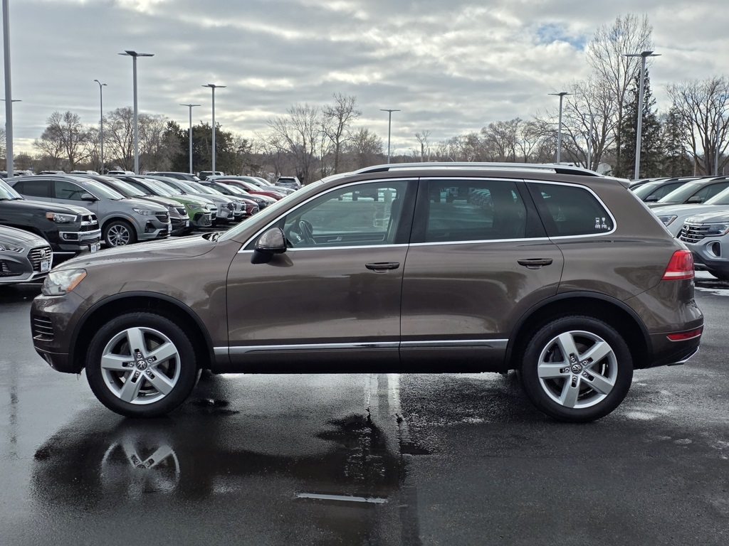 Used 2014 Volkswagen Touareg Sport with VIN WVGEP9BP3ED009349 for sale in St. Cloud, MN