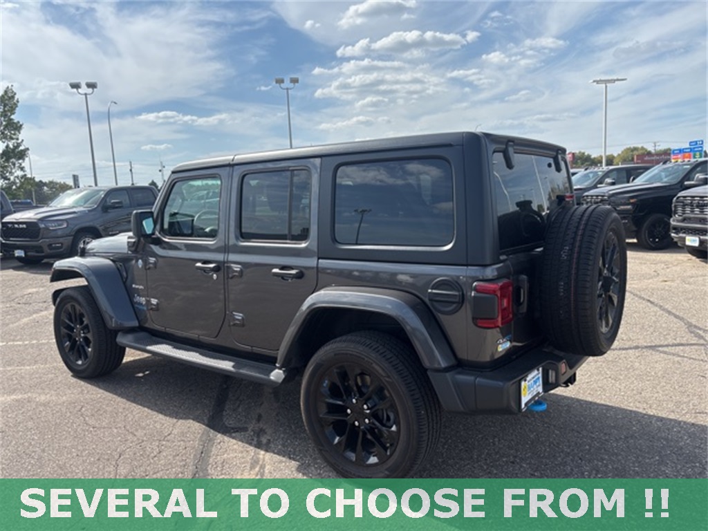 Used 2022 Jeep Wrangler Unlimited Sahara 4XE with VIN 1C4JJXP6XNW279160 for sale in Rochester, Minnesota