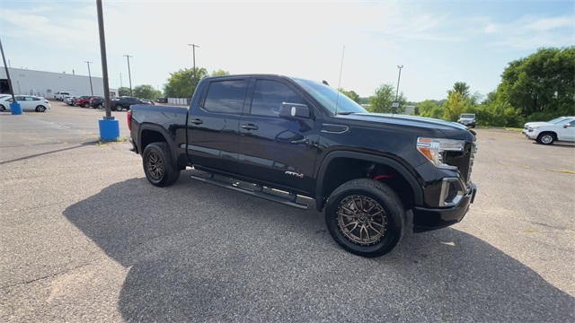 Used 2021 GMC Sierra 1500 AT4 with VIN 3GTP9EELXMG369759 for sale in Apple Valley, Minnesota
