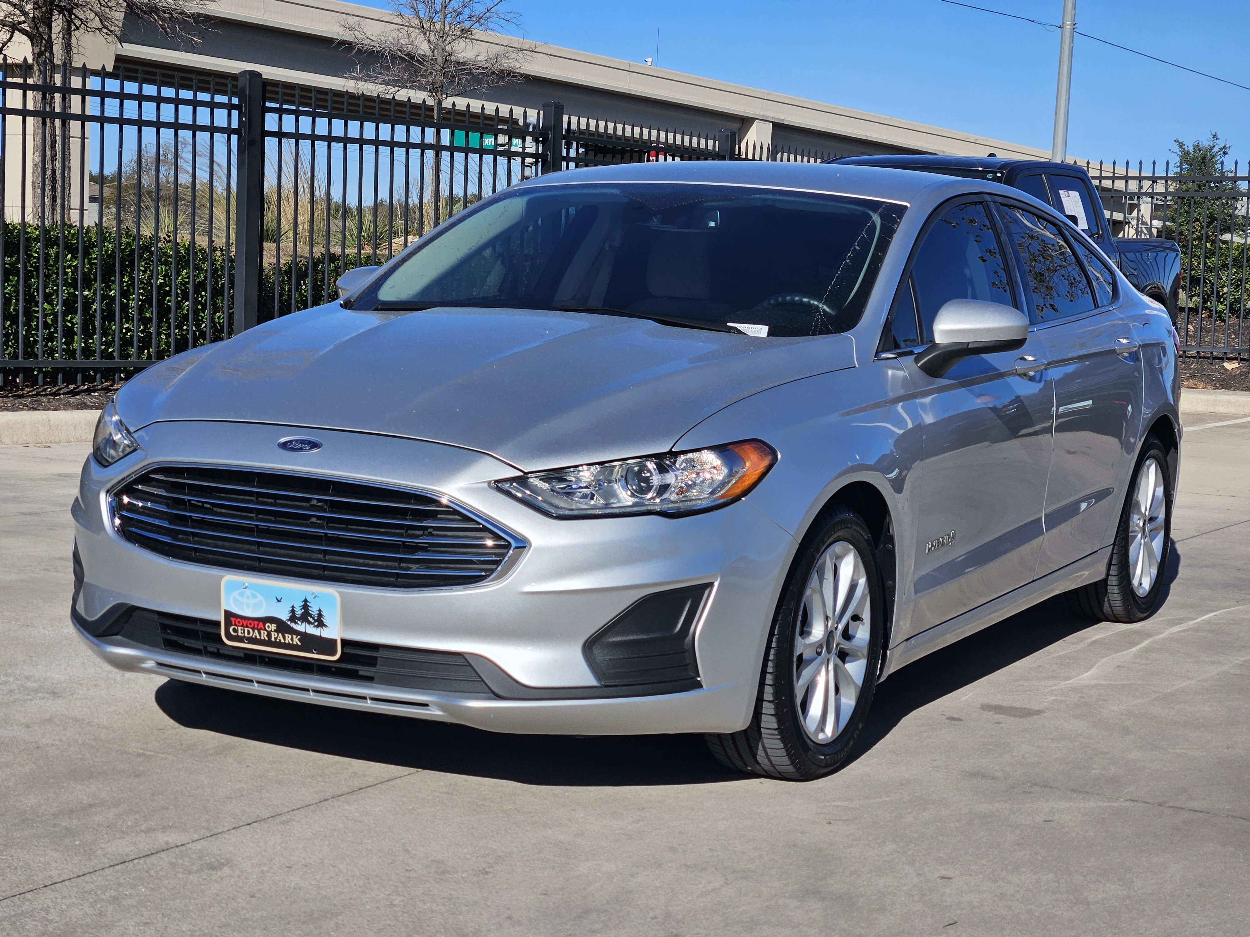 Used 2019 Ford Fusion Hybrid SE with VIN 3FA6P0LU8KR220600 for sale in Leander, TX