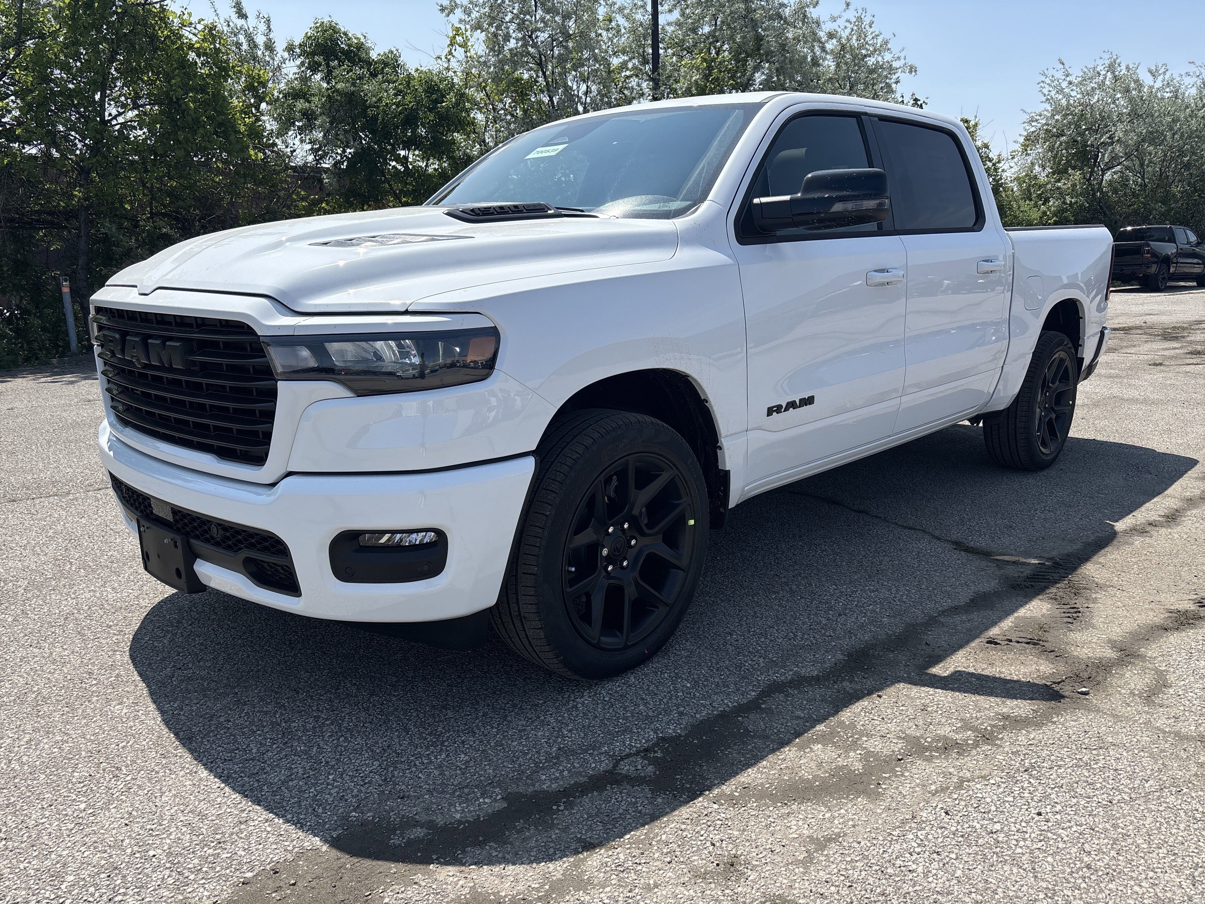 New 2025 Bright White Ram Sport image 1