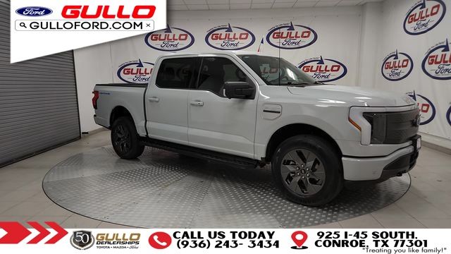 Used 2023 Ford F-150 Lightning XLT with VIN 1FT6W1EV0PWG29316 for sale in Conroe, TX